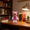 A set of Five Nights at Freddy's Bonnie and friends mini building block figures displayed on a wooden desk.