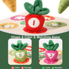A matching game set featuring a strawberry and carrot shapes for toddlers to learn color and number recognition