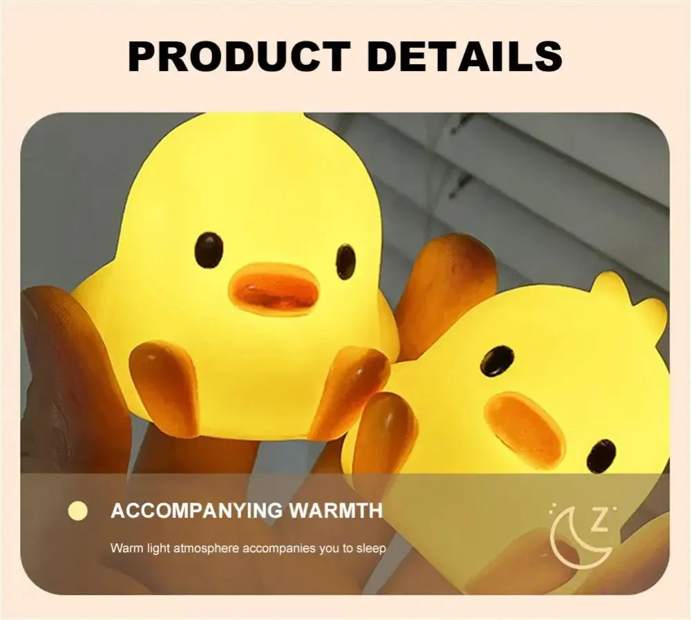 A yellow cartoon duck night light illuminating a hand, providing a warm light atmosphere for sleeping.