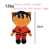 An orange plush doll with black hair and an orange shirt and black pants.