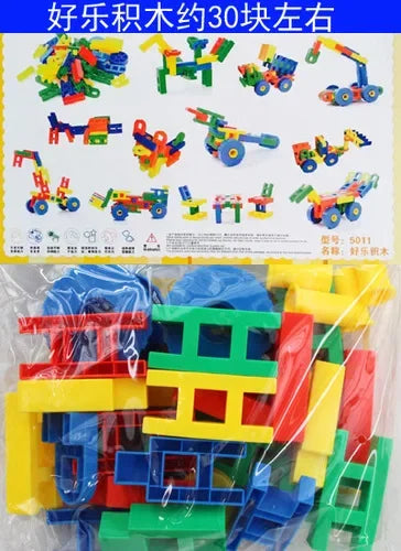 A pile of colorful plastic building blocks in various shapes and colors including red, yellow, blue, and green.