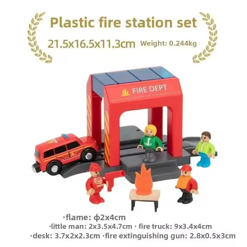 Plastic fire station set with a red building, orange fire truck, and accessories for children's play