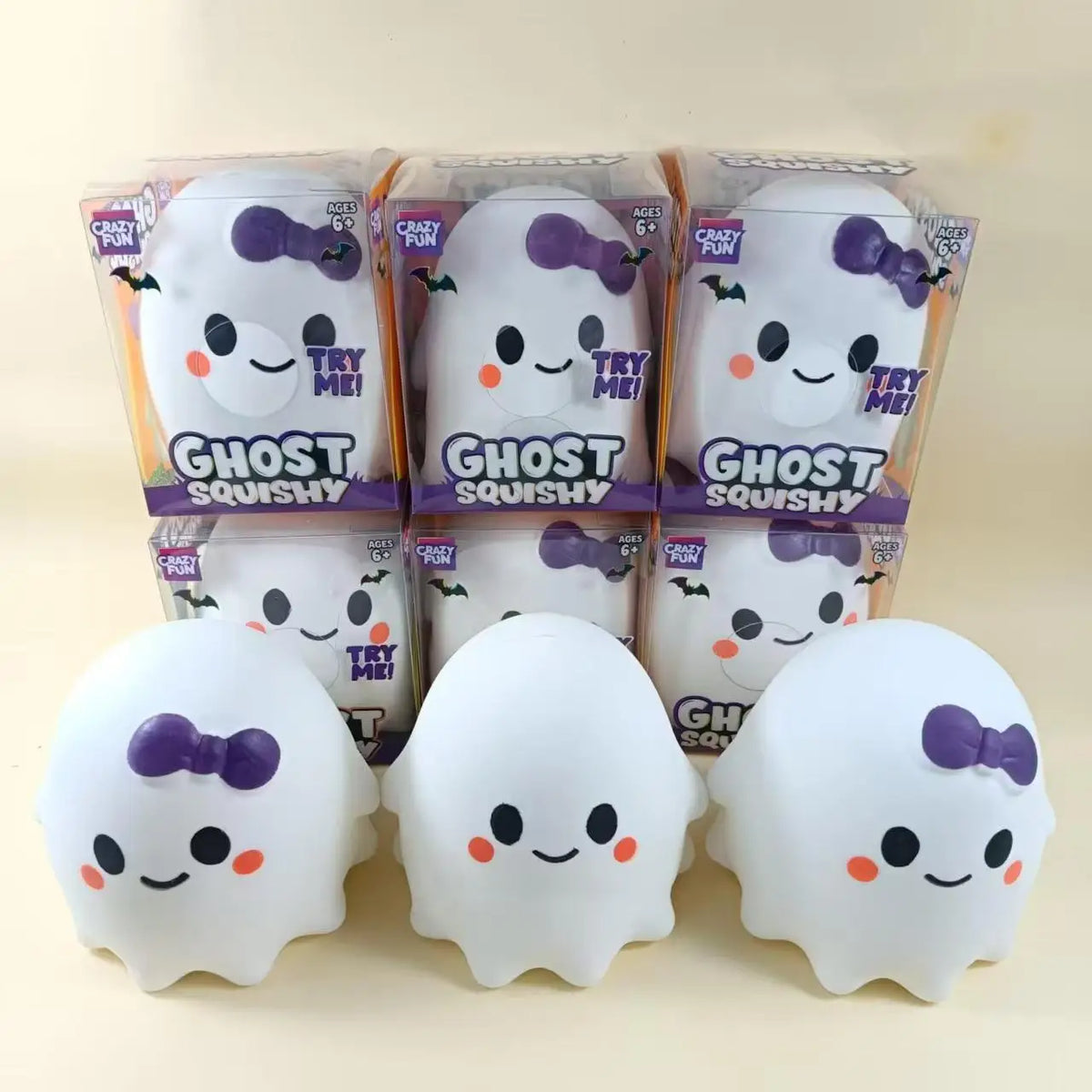 Pack of six white ghost squishy stress relief toys in clear packaging and loose.