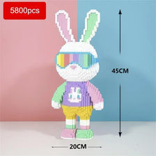 A white and purple building block set shaped like a rabbit wearing a colorful visor and a bear body, displayed against a blue