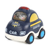A blue and yellow police car toy with a clear headlight on, designed as a soft rubber push and go vehicle for babies.
