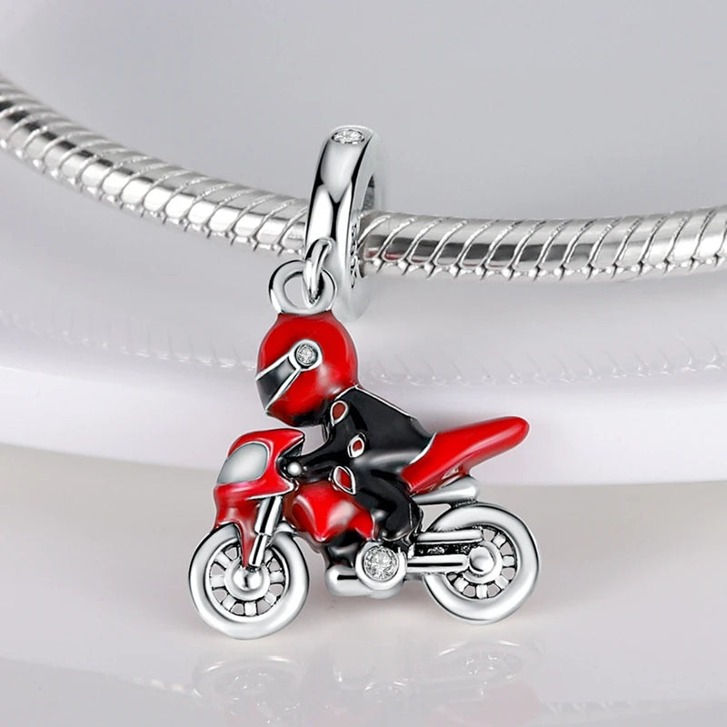 Sterling silver charm bead pendant of a red and black motorcycle.