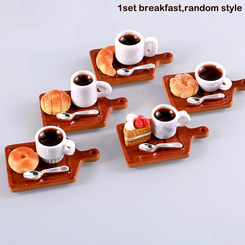 A set of five mini resin coffee cups and food items for a dollhouse kitchen display