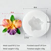 A white silicone mold with a multi-flower design, showing the finished size and weight specifications.