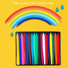 A set of colorful, triangular-grip crayons displayed in a black case against a yellow background with a rainbow arch.