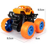 Orange and black four-wheel drive stunt car with pull-back action featuring large rubber wheels.