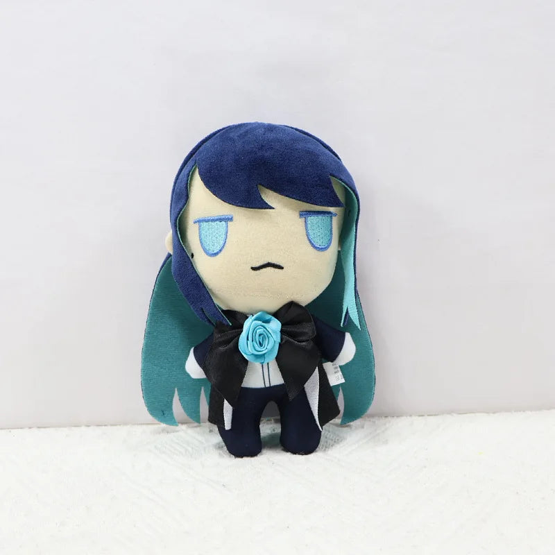 A plush doll of Ado Hibana with dark blue hair and blue eyes wearing a black ribbon bow