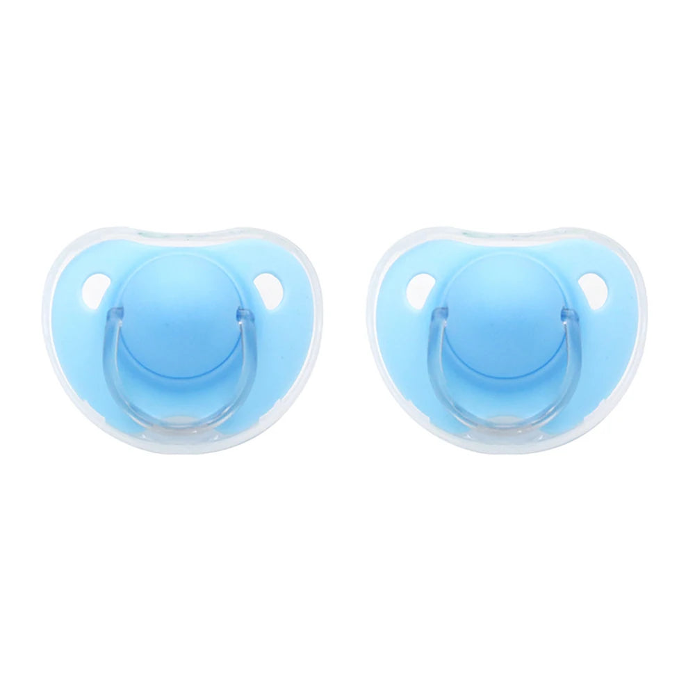 A pair of light blue silicone pacifiers with protective covers shown from above.