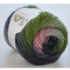 A ball of hand-dyed rainbow merino wool yarn in shades of green, pink, and black, shown from the side.