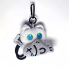 A white fluffy cat plush toy with blue eyes is attached to a black keychain ring.