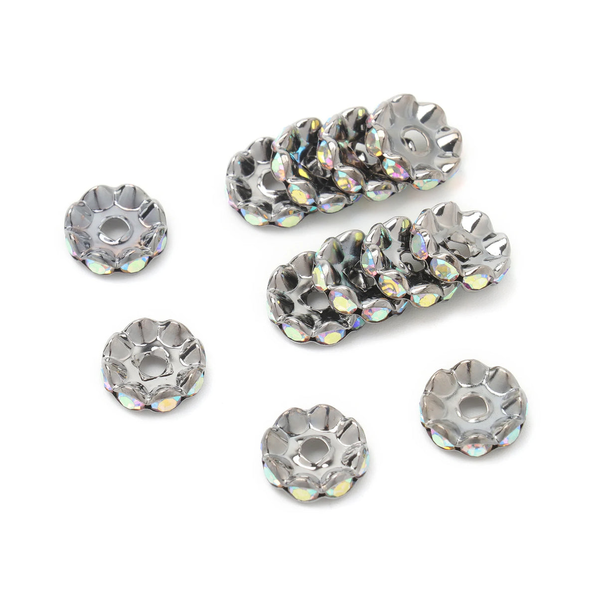 A collection of 12mm crystal rhinestone spacer beads in various sizes and shapes for jewelry making