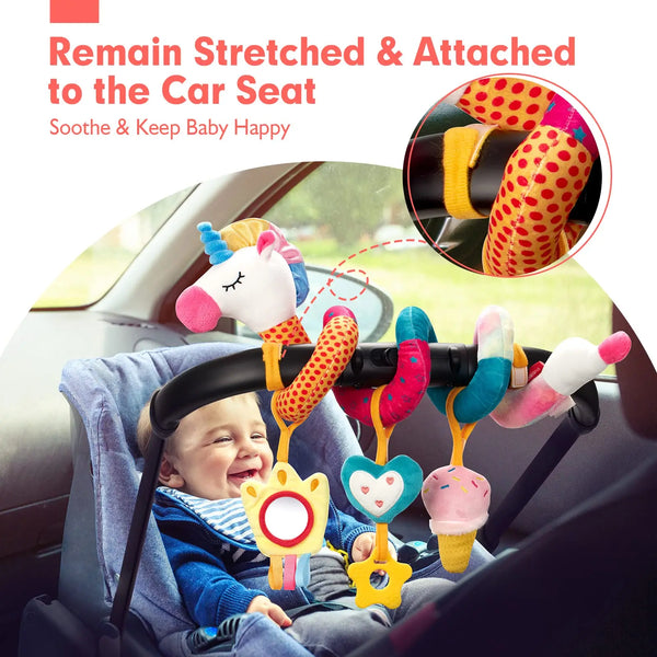 A baby is seated in a car seat with a set of colorful, stretched and attached rattles hanging from the car seat.