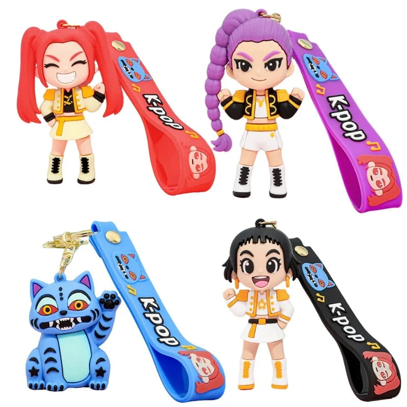 A collection of anime demon hunter keychains featuring collectible dolls in various colors and designs.