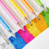 A set of colorful glitter gel pens in various shades are laid out on a white background.