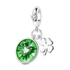 A silver fruit charm bead set featuring a green leaf and a silver flower design.