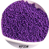 A pile of purple 1.5mm solid glass seed beads for jewelry and craft.