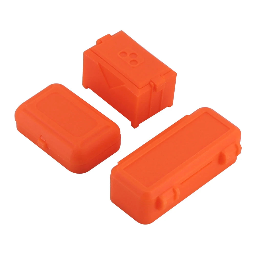 Set of three orange plastic mini storage boxes for RC crawler parts