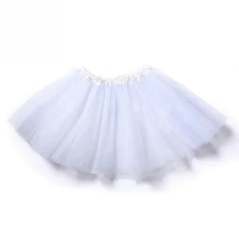 White three-layer tutu skirt for girls with a gathered waistband