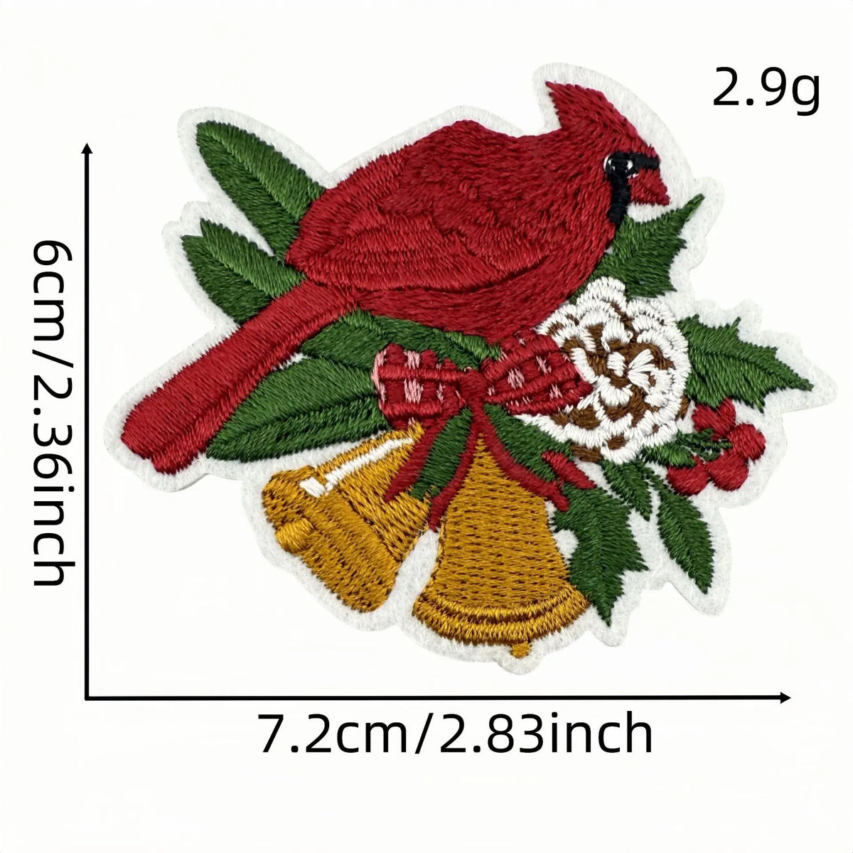 A red bird patch featuring a bow and yellow bells on green foliage.
