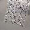 Clear stickers featuring various gothic symbols and shapes for nail art