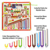 A colorful magnetic maze puzzle board with paths for marble runs and a color recognition toy featuring ten colored beads.