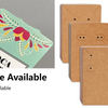 A display of square kraft jewelry cards with floral designs and a stack of white cards.