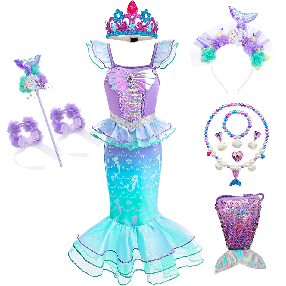 A purple and teal mermaid fantasy dress with a ruffled fishtail skirt and a crown accessory.