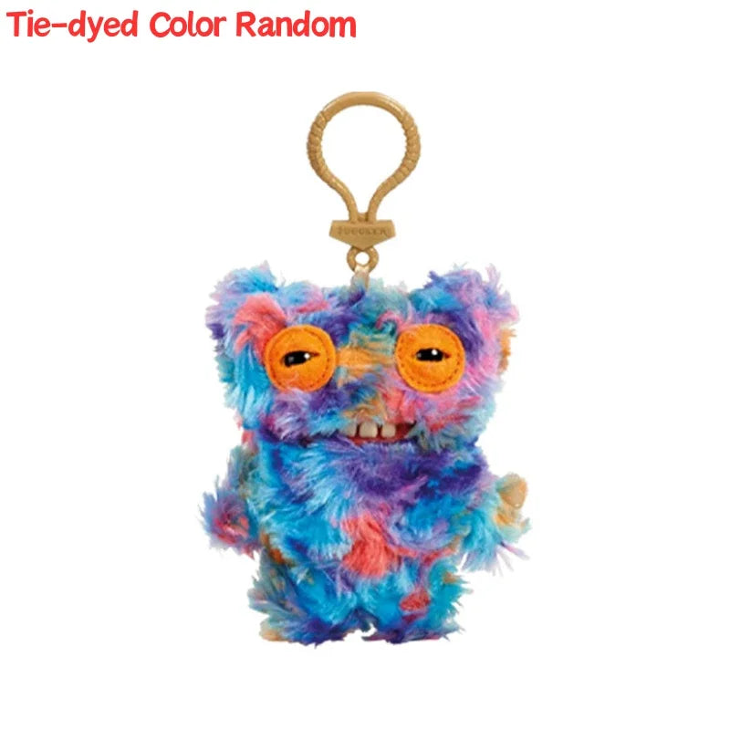 Tie-dyed colorful plush monster keychain with large eyes and a rabbit design