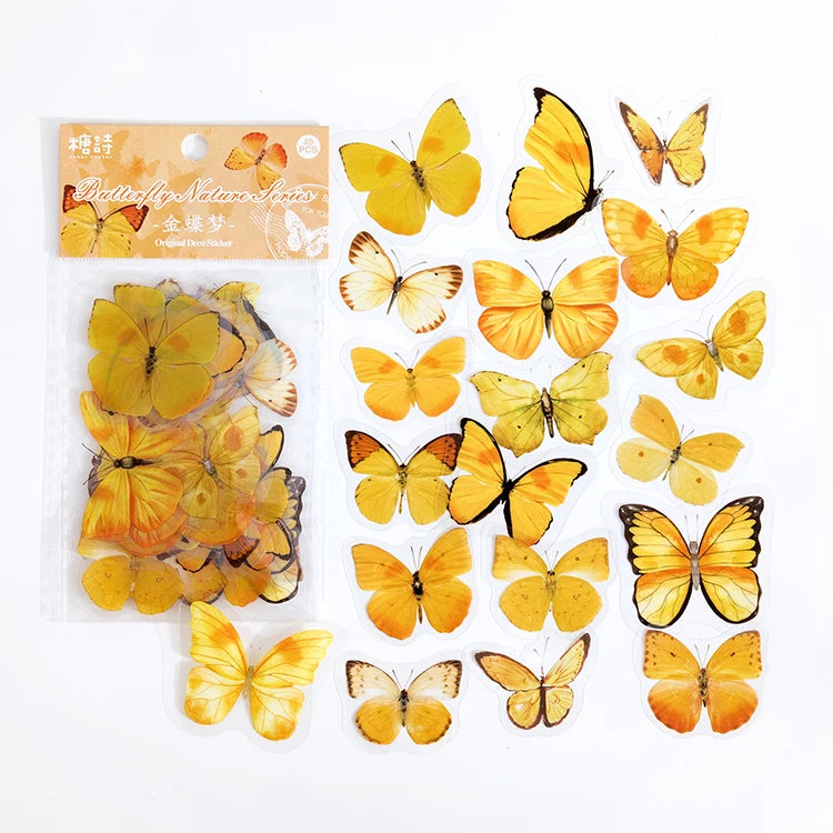 A set of colorful butterfly stickers in various shades of yellow and orange for scrapbooking and journaling.