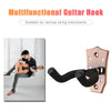 A bronze guitar hook is shown mounted on a wall, demonstrating its use for securing string instruments.