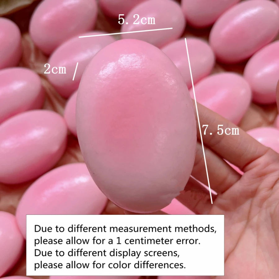 A pink squishy cheese cake stress relief toy is shown in a hand, with various size measurements visible.