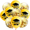 A set of gold balloons decorated with black confetti and graduation caps for party decor
