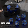 A set of seven photoelectric LED glow dice in blue and green colors displayed on a black surface.