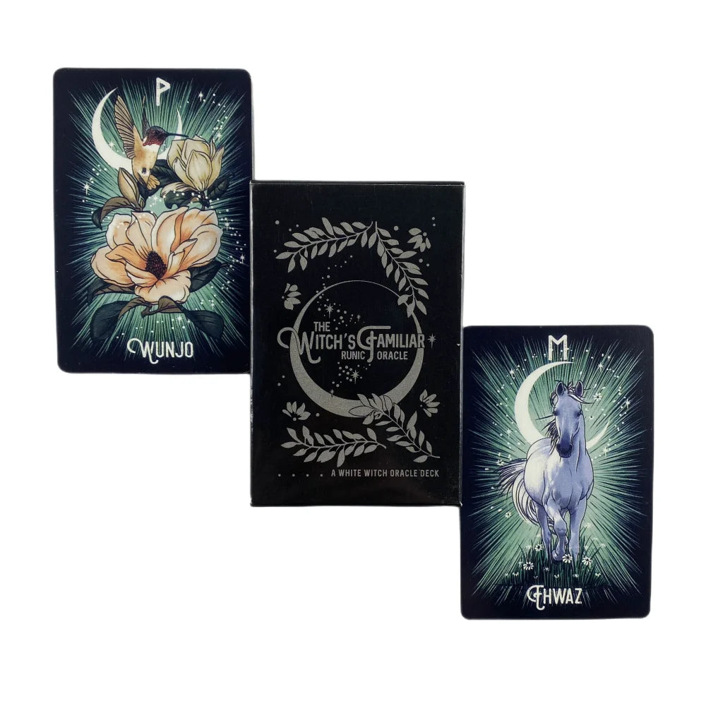 A set of four black oracle cards featuring mystical imagery including a bird, a flower, and a horse.