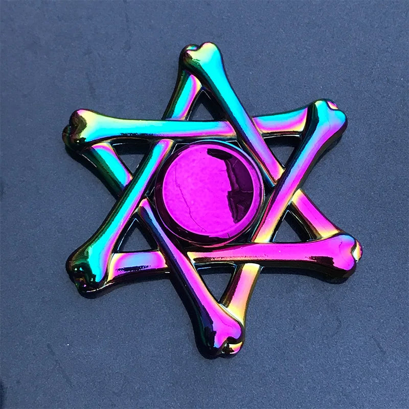A shiny, iridescent rainbow metal fidget spinner with a central purple sphere.