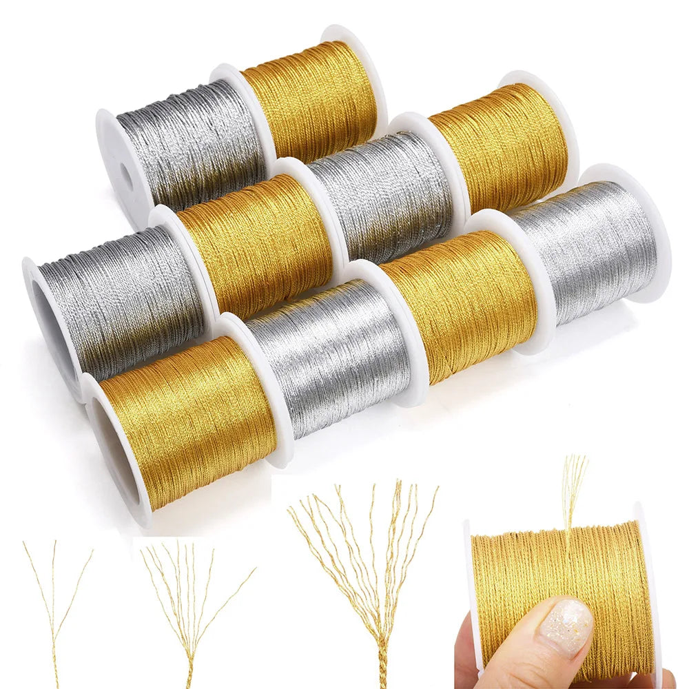 Spools of metallic craft cord in gold and silver colors shown next to a hand