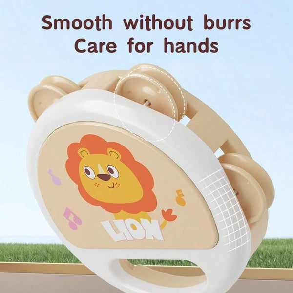 A light beige and white handheld baby clapping tambourine instrument with a lion design.