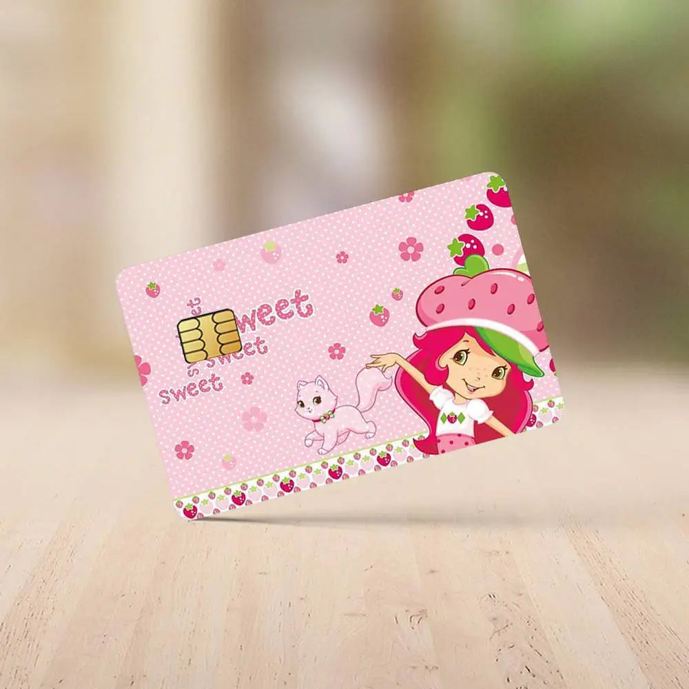 A pink and green cartoon strawberry shortcake credit card sticker set featuring a sweet character and pink floral patterns.
