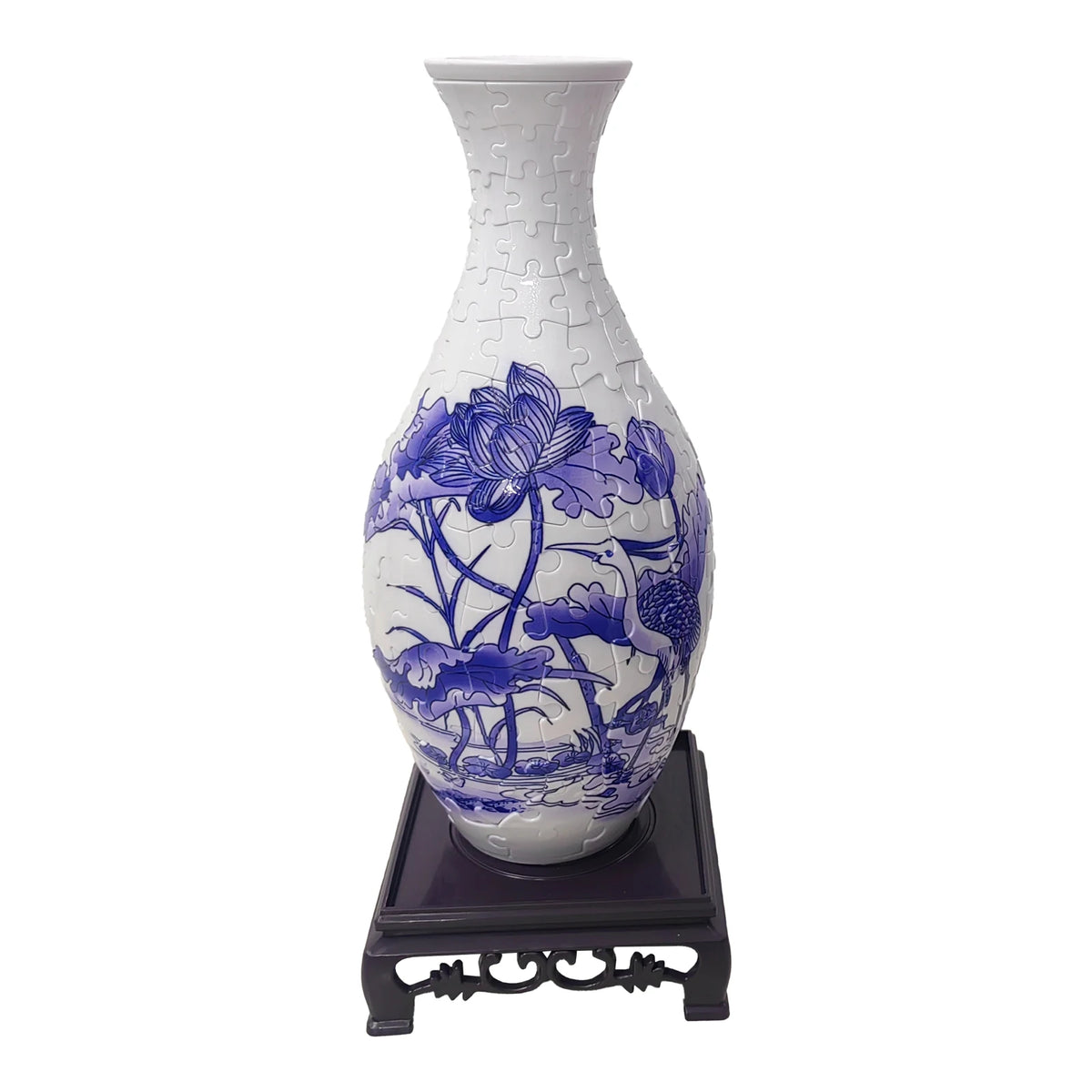 Blue and white porcelain flower vase puzzle featuring floral designs on a stand
