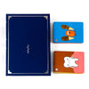 A set of three cards featuring characters from a party game, including a blue card with a stylized figure and two other cards