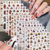 A collection of 12 sheets of vintage angel and saint nail art stickers featuring cherubs and crosses on fingernails.