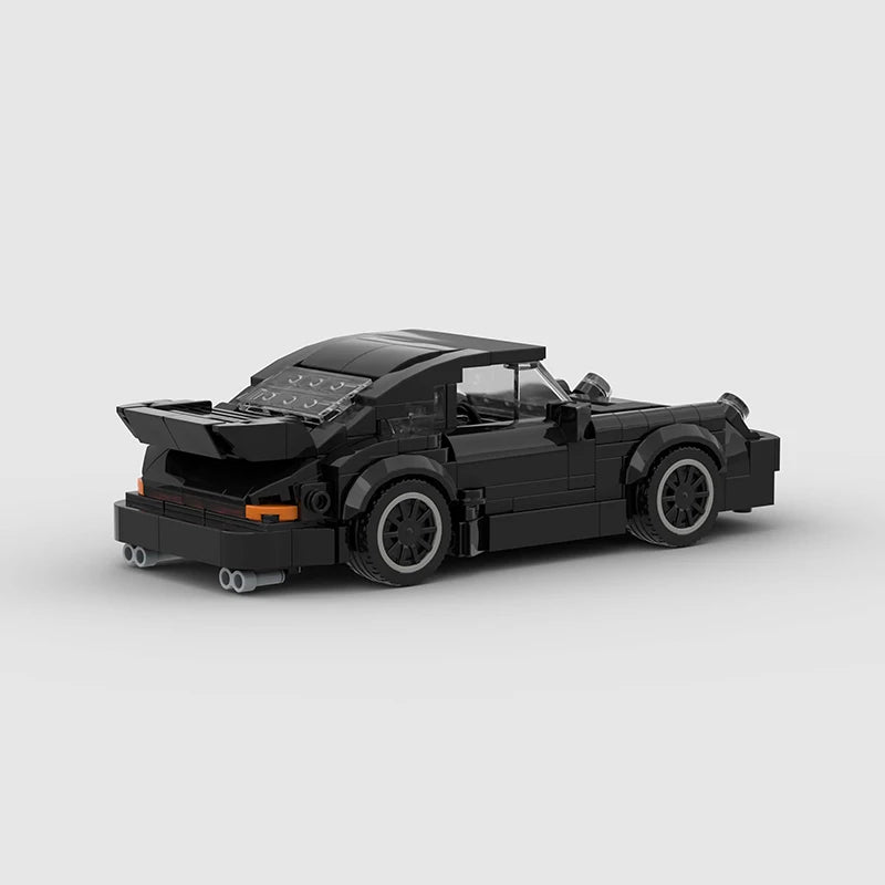 A black classic rally car building block set with a black roof and open cockpit.