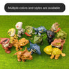 A collection of various dinosaur fossil toys in multiple colors and styles displayed on green grass.