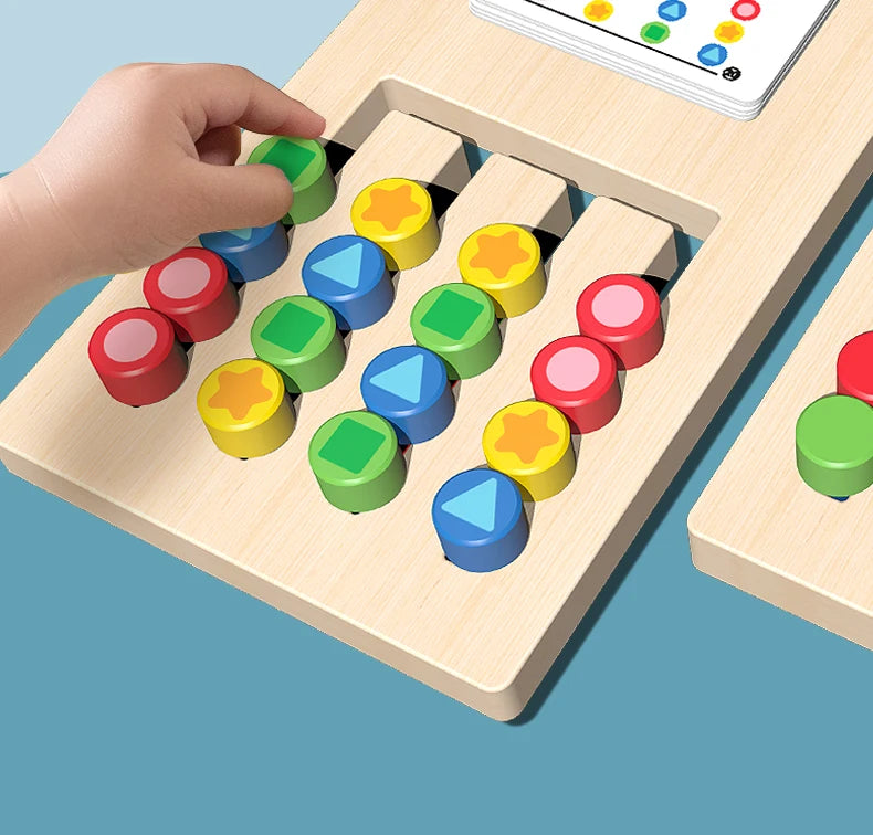A hand places colored wooden shapes onto a matching board for a kids game.