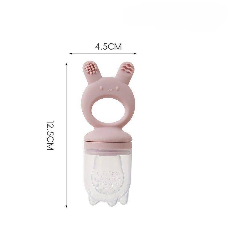 A pink silicone fruit food feeder and cooling mold set with a clear container.