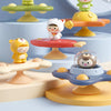 A set of three suction cup spinner bath toys for babies featuring animal figures in green, yellow, and white.